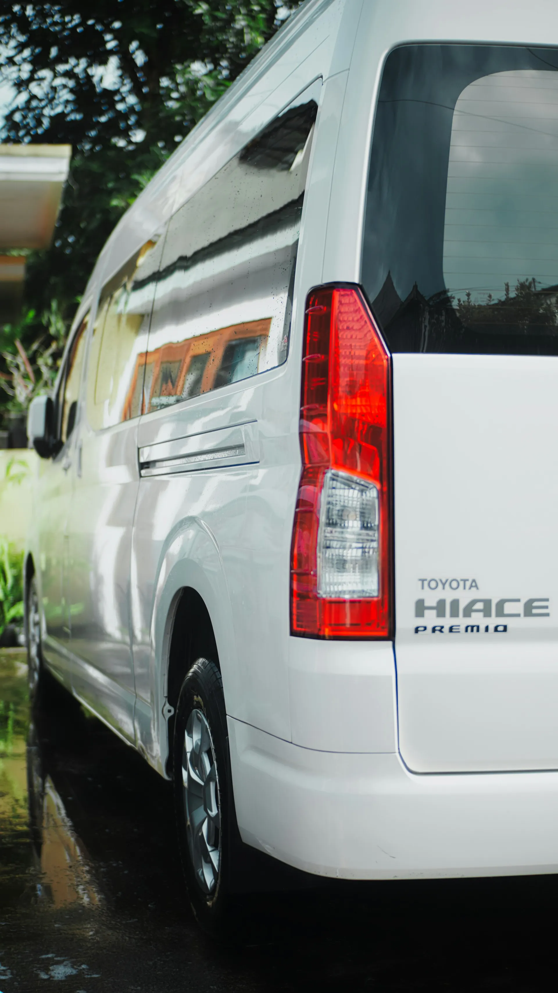 White Toyota Hiace passenger van