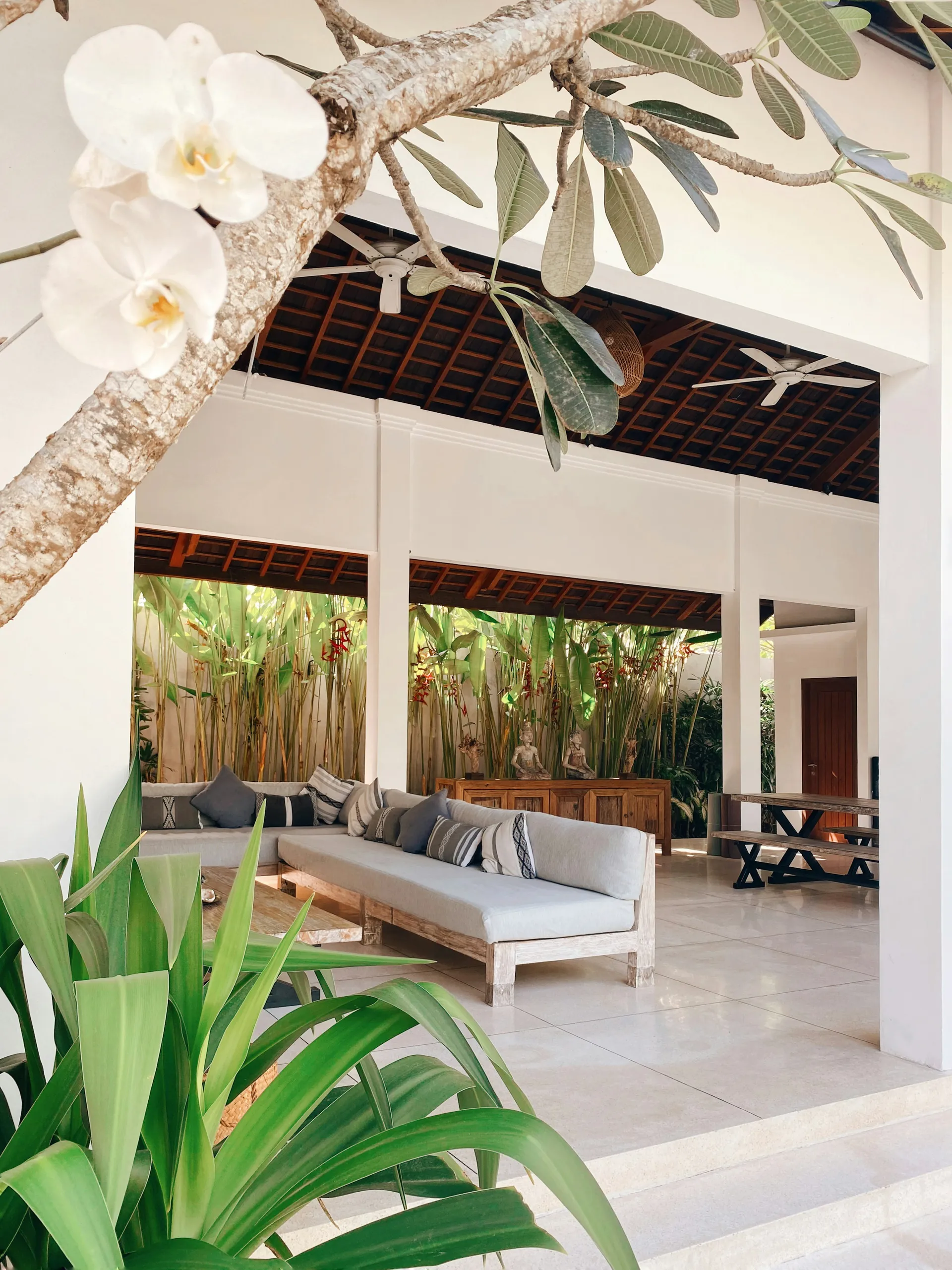 Open-air Indonesian villa with tropical plants